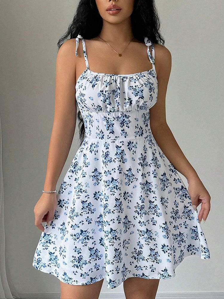 Lara | Rochie scurtă cu bretele fine și imprimeu floral