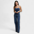 Julie - Salopetă din denim cu pantaloni evazați și detaliu cu legare