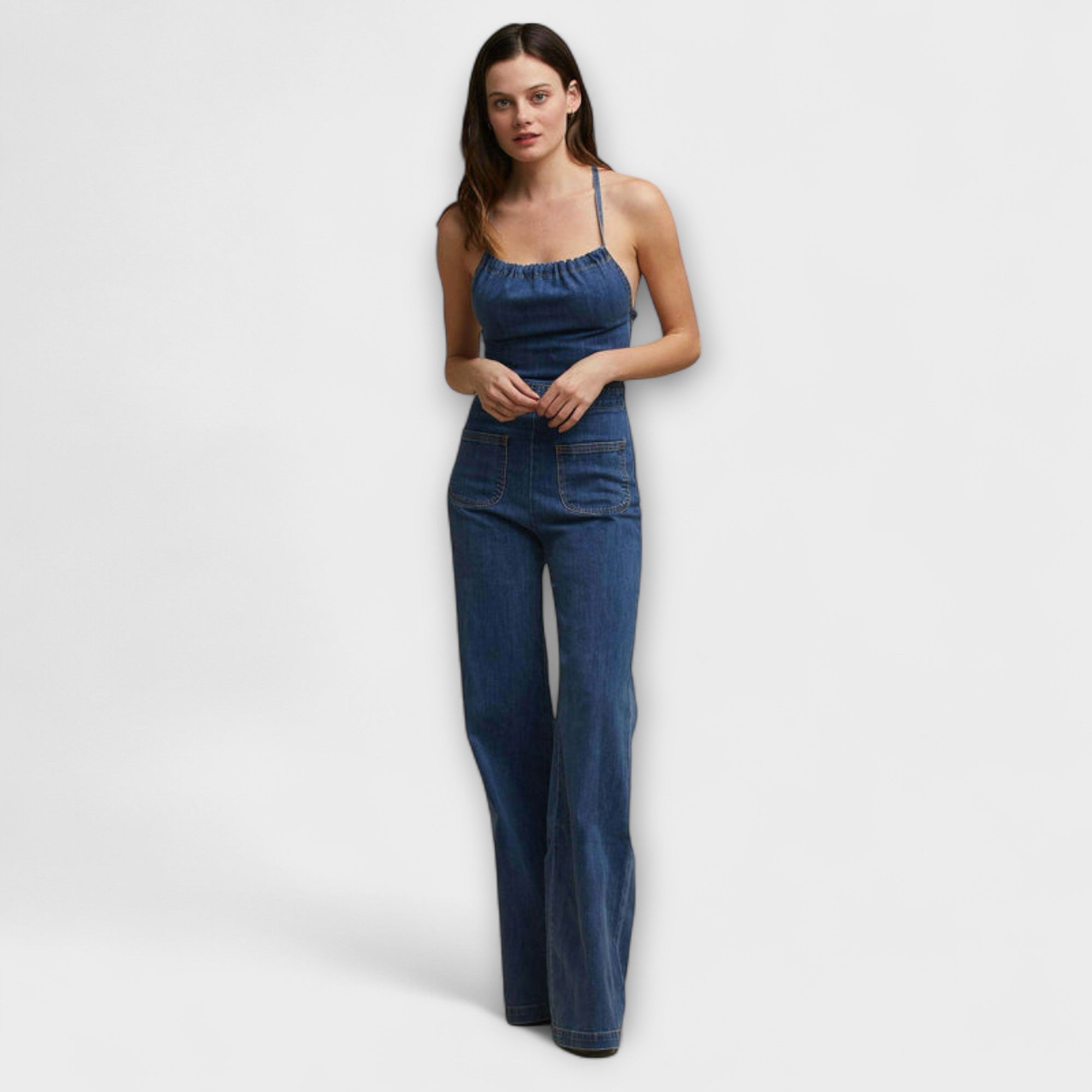 Julie - Salopetă din denim cu pantaloni evazați și detaliu cu legare