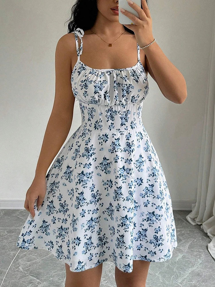 Lara | Rochie scurtă cu bretele fine și imprimeu floral